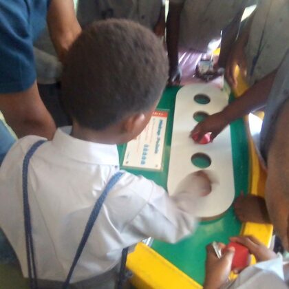 Learners engaging with SAASTA's interactive exhibits during Astronomy and Space Science Ex