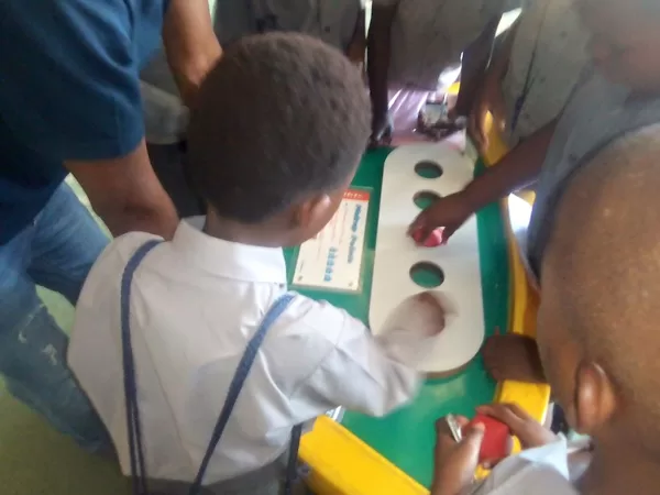 Learners engaging with SAASTA's interactive exhibits during Astronomy and Space Science Ex